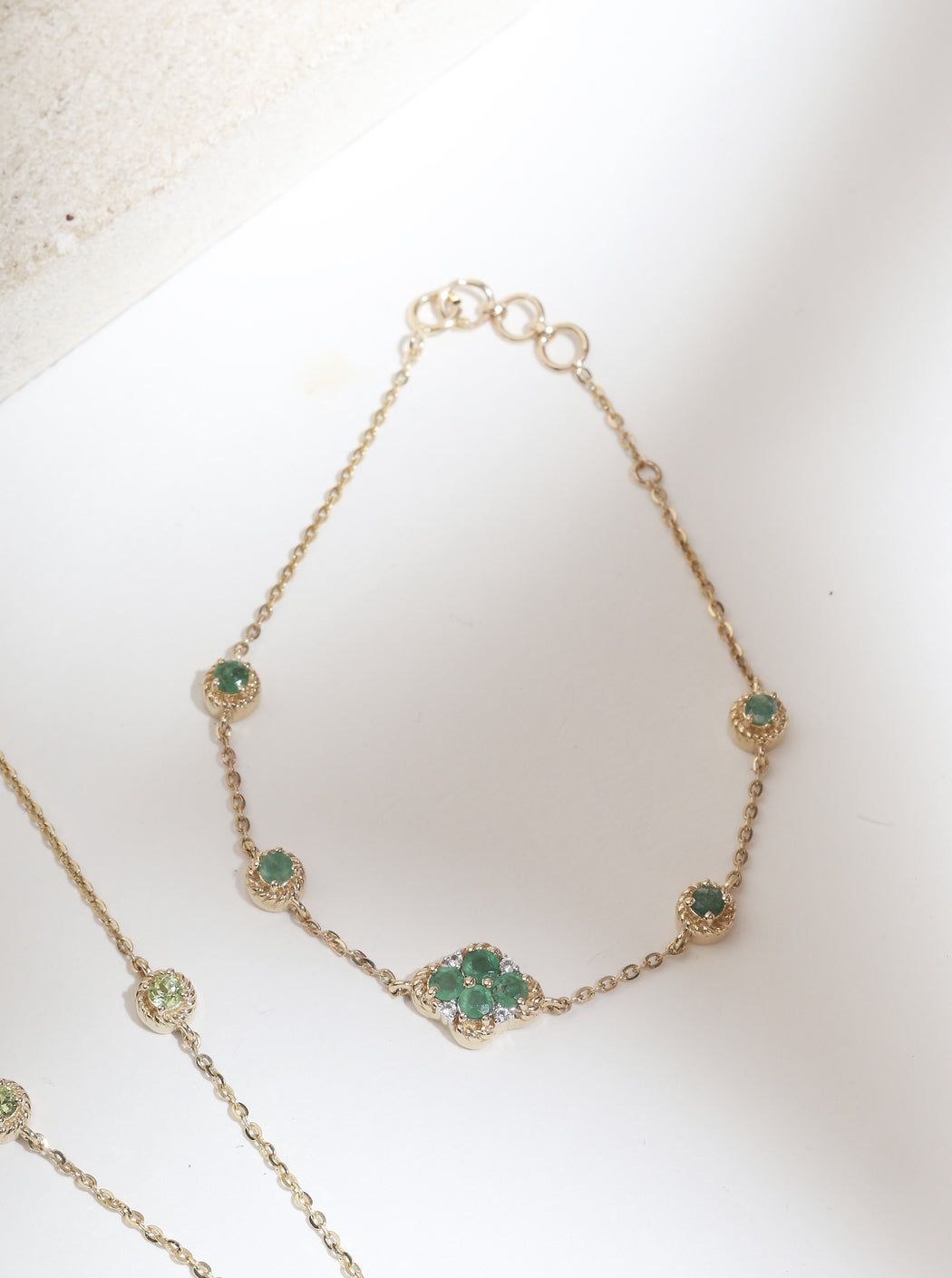 Emerald and peridot with white sapphire 14k gold bracelet