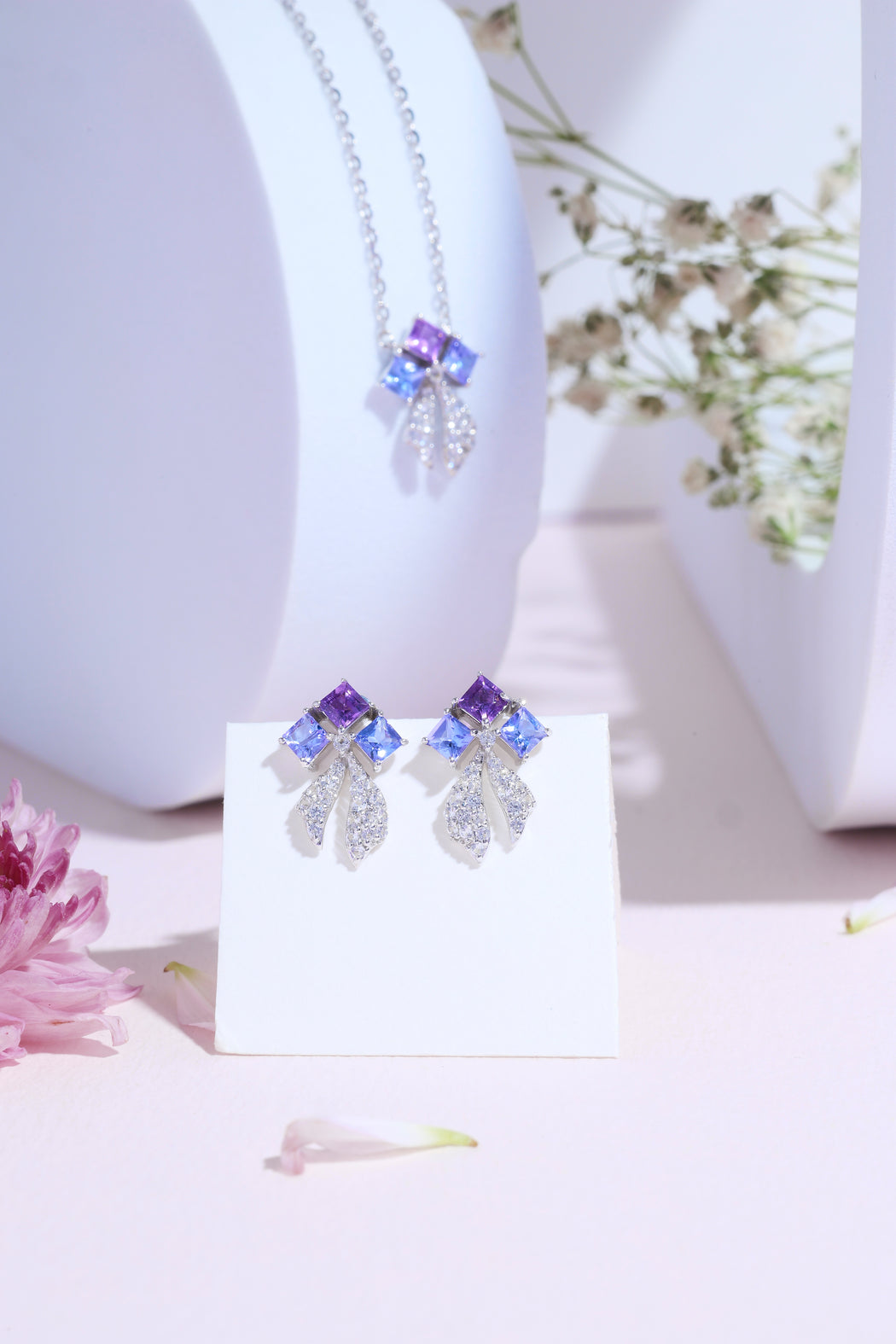 Tanzanite and amethyst bow 14k gold earrings