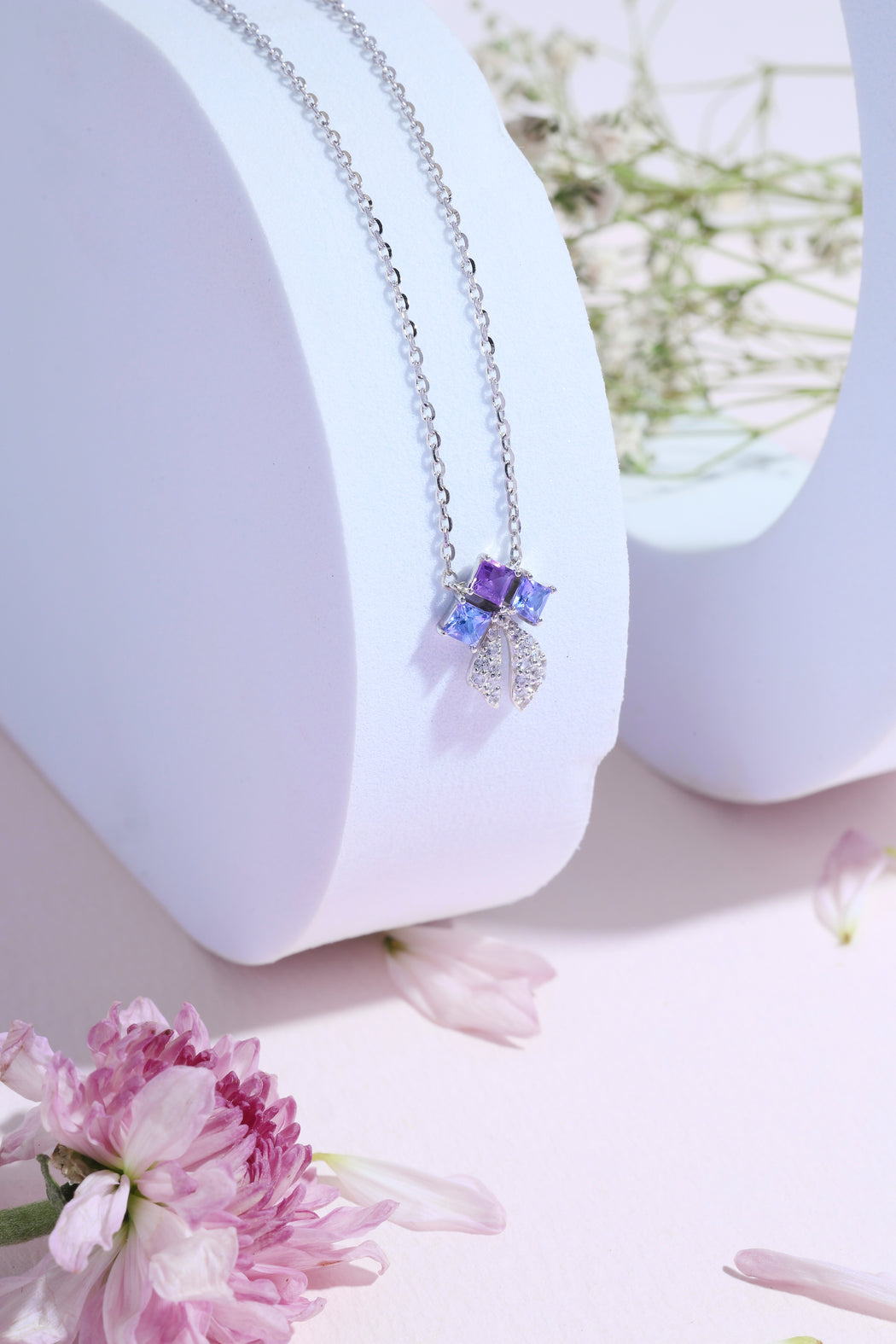 Tanzanite and amethyst bow 14k gold necklace