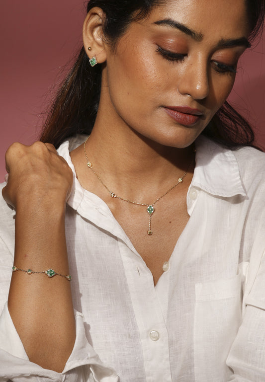 Emerald and peridot set with white sapphire in 14k gold