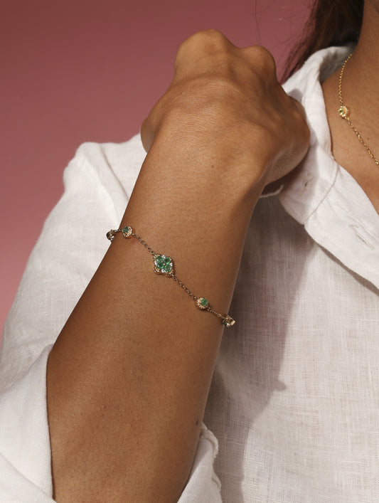 Emerald and peridot with white sapphire 14k gold bracelet